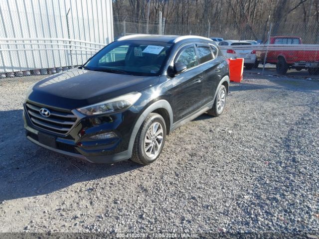 KM8J3CA26GU042202 Hyundai Tucson Eco