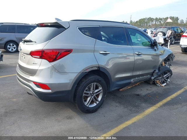 5NMZU3LB1JH066987 Hyundai Santa Fe Sport 2.4l