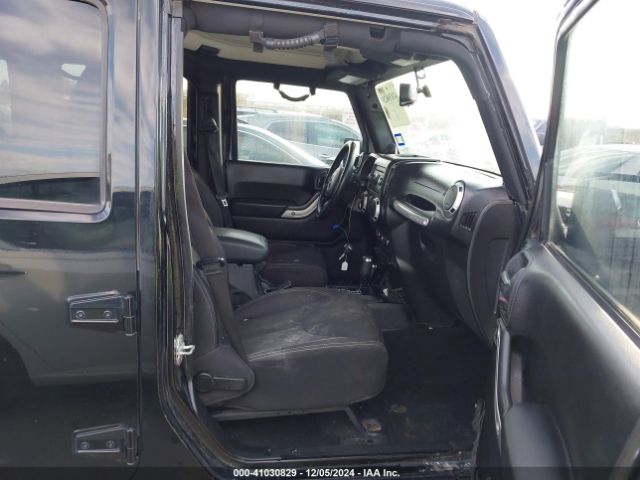 1C4BJWEG8EL116941 Jeep Wrangler Unlimited Sahara
