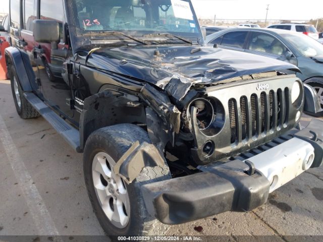 1C4BJWEG8EL116941 Jeep Wrangler Unlimited Sahara
