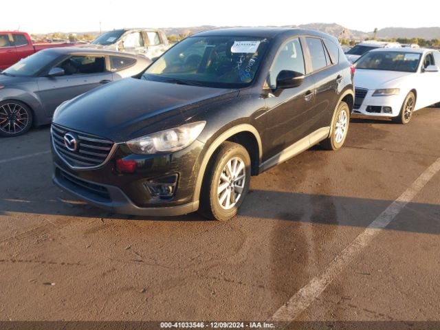 JM3KE2CY5G0704574 Mazda Cx-5 Touring