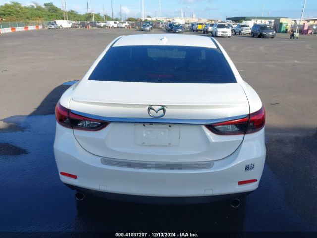 JM1GL1X57H1144504 Mazda py