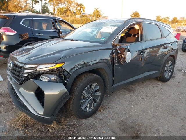 KM8JBCA19NU015096 Hyundai Tucson Hybrid Blue