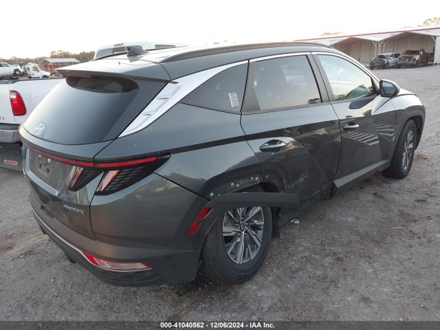 KM8JBCA19NU015096 Hyundai Tucson Hybrid Blue