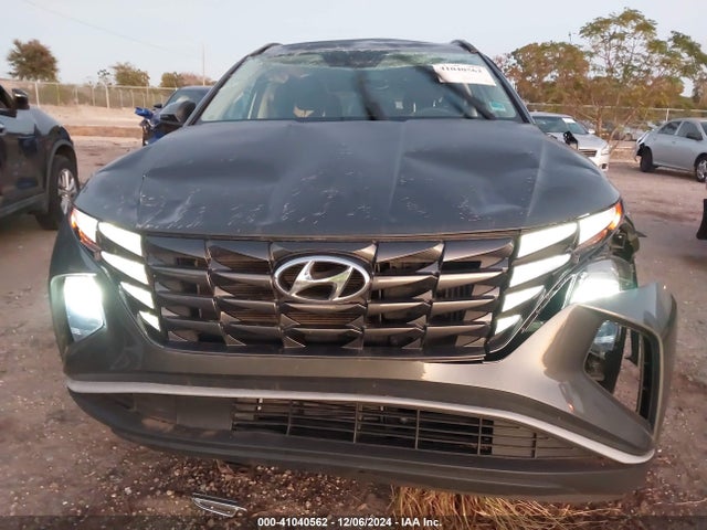 KM8JBCA19NU015096 Hyundai Tucson Hybrid Blue