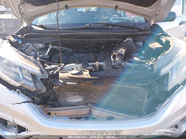 2HKRM4H34GH614838 Honda CR-V LX