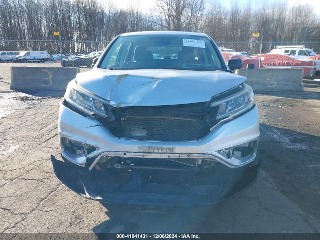 2HKRM4H34GH614838 Honda CR-V LX