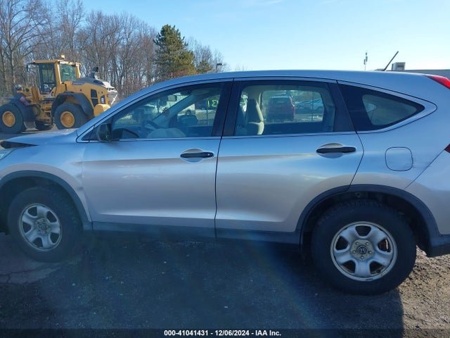 2HKRM4H34GH614838 Honda CR-V LX