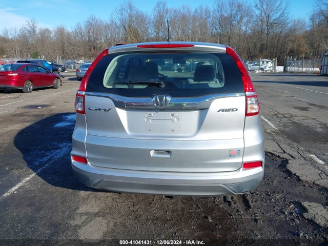 2HKRM4H34GH614838 Honda CR-V LX