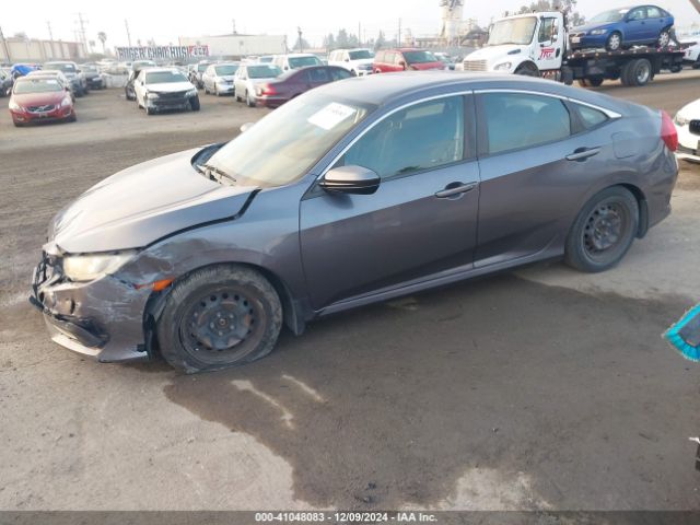 2HGFC2F52GH565874 Honda Civic Lx