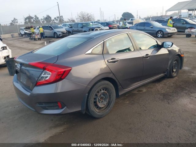 2HGFC2F52GH565874 Honda Civic Lx