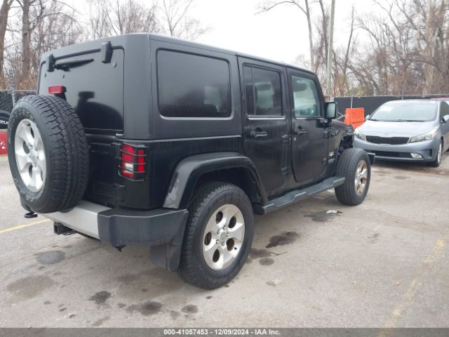 1C4BJWEG7EL252011 Jeep Wrangler Unlimited Sahara