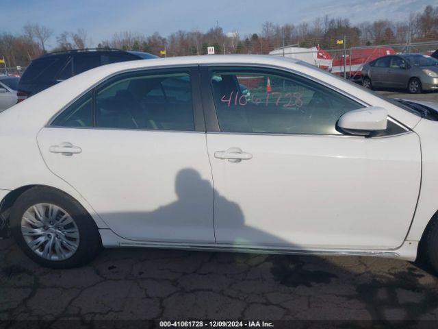 4T1BD1FK5EU100232 Toyota Camry Hybrid Le