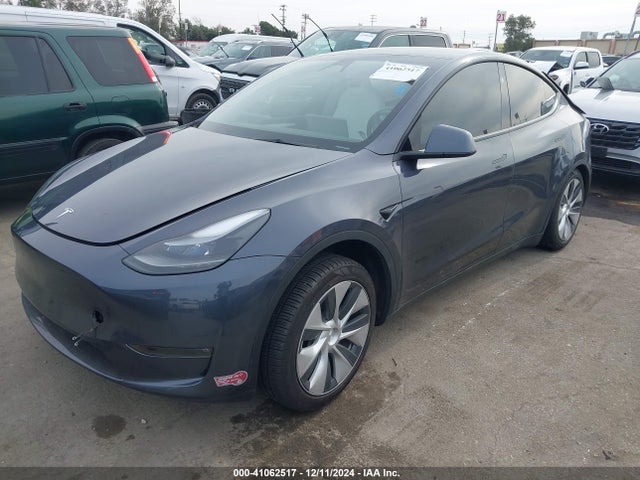 2023 TESLA MODEL Y 7SAYGDEE0PF884546 Photo 1