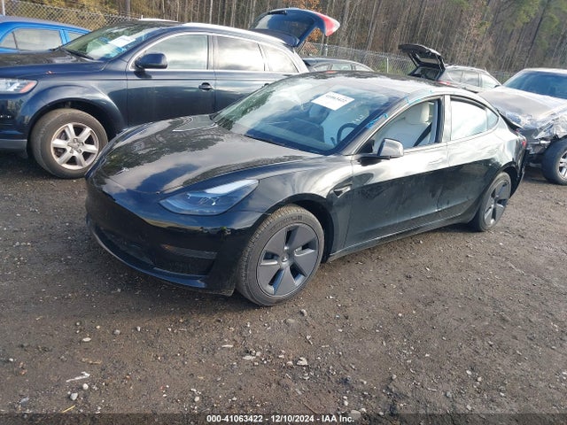 2023 TESLA MODEL 3 5YJ3E1EA4PF554885 Photo 1