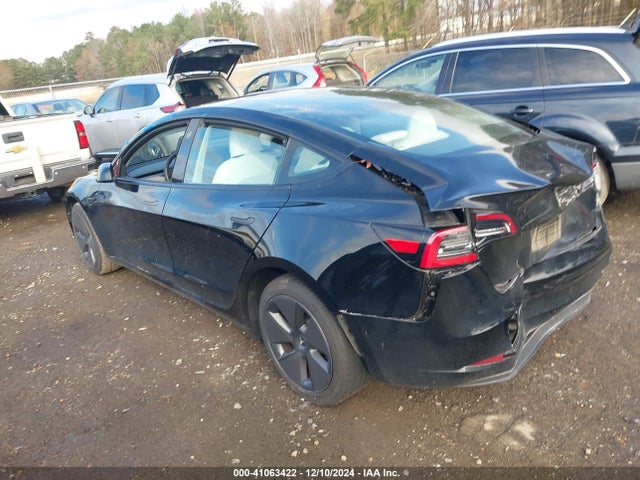 2023 TESLA MODEL 3 5YJ3E1EA4PF554885 Photo 2