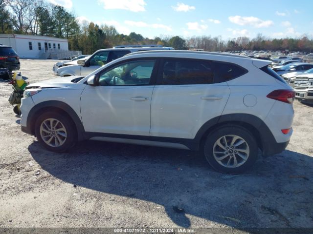 KM8J33A40HU402826 Hyundai TUCSON SE