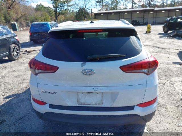 KM8J33A40HU402826 Hyundai TUCSON SE