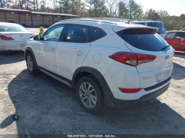 KM8J33A40HU402826 Hyundai TUCSON SE