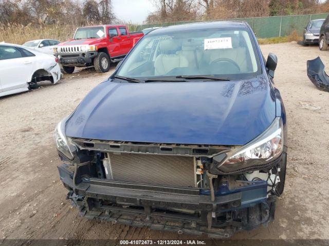 4S3GTAA69J3753671 Subaru Impreza 2.0i
