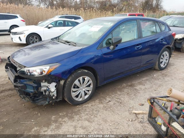 4S3GTAA69J3753671 Subaru Impreza 2.0i