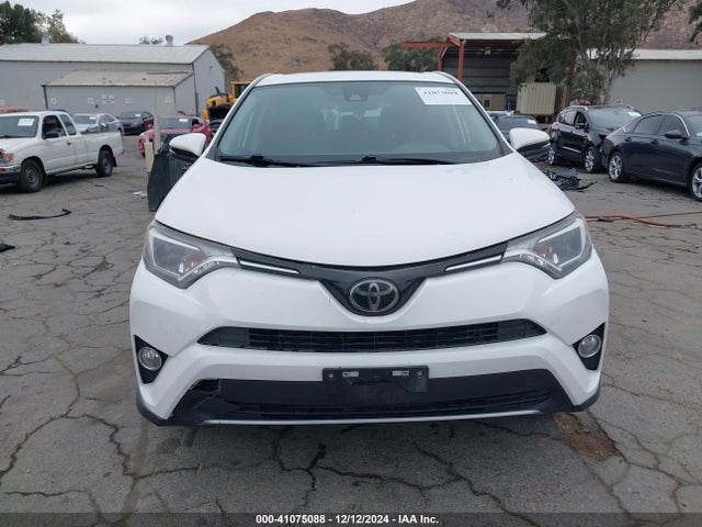JTMWFREV7JJ730811 Toyota Rav4 Xle