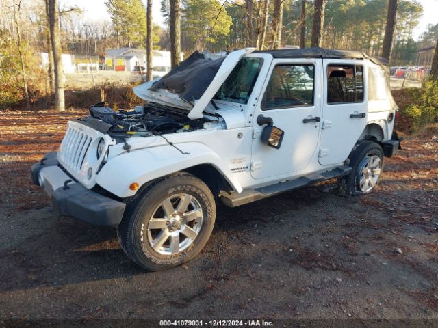 1C4BJWEG4FL568113 Jeep Wrangler Unlimited Sahara