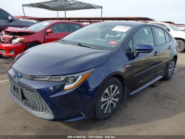 JTDEAMDE7MJ029933 Toyota Corolla Hybrid Le