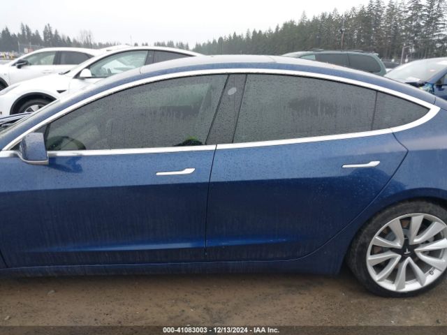 5YJ3E1EA4JF038565 Tesla Model 3 Long Range/mid Range