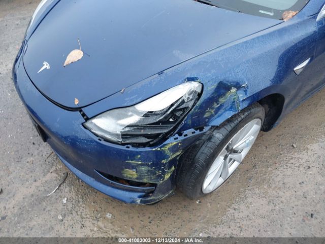 5YJ3E1EA4JF038565 Tesla Model 3 Long Range/mid Range
