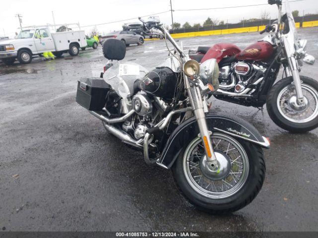 2015 HARLEY-DAVIDSON FLSTC 1HD1BWV36FB028420