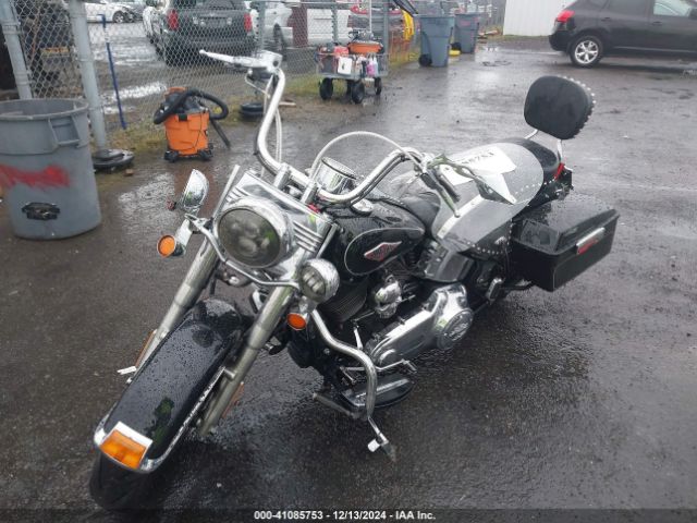 2015 HARLEY-DAVIDSON FLSTC 1HD1BWV36FB028420 Photo 1