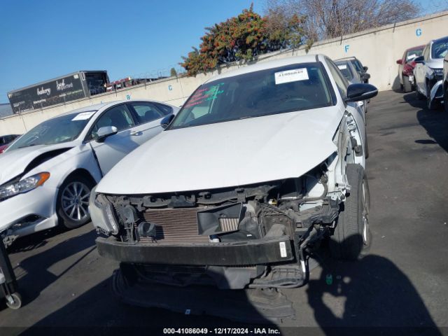 5XXGT4L18HG142138 KIA Optima Lx Turbo