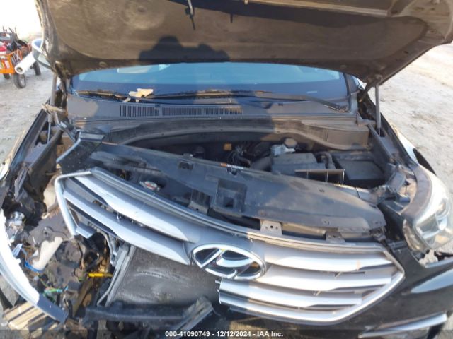 5NMZU3LB5HH001232 Hyundai Santa Fe Sport 2.4l