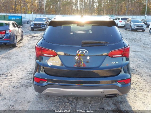 5NMZU3LB5HH001232 Hyundai Santa Fe Sport 2.4l