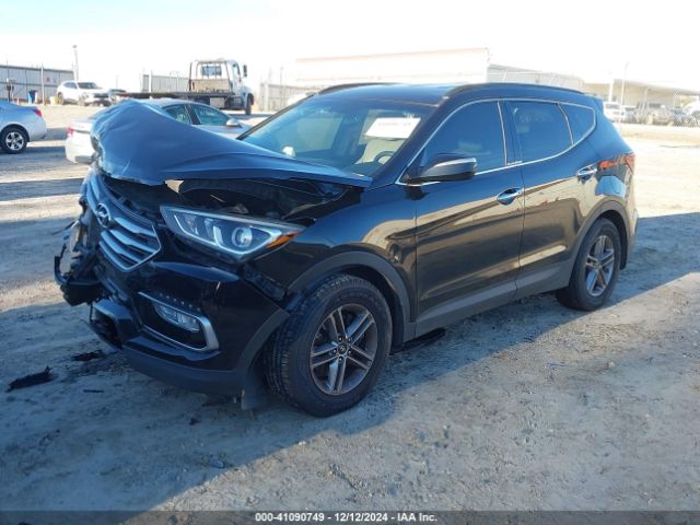 5NMZU3LB5HH001232 Hyundai Santa Fe Sport 2.4l