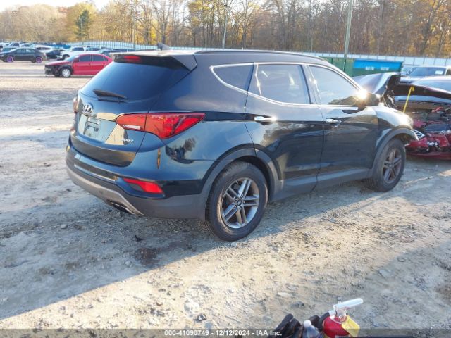 5NMZU3LB5HH001232 Hyundai Santa Fe Sport 2.4l