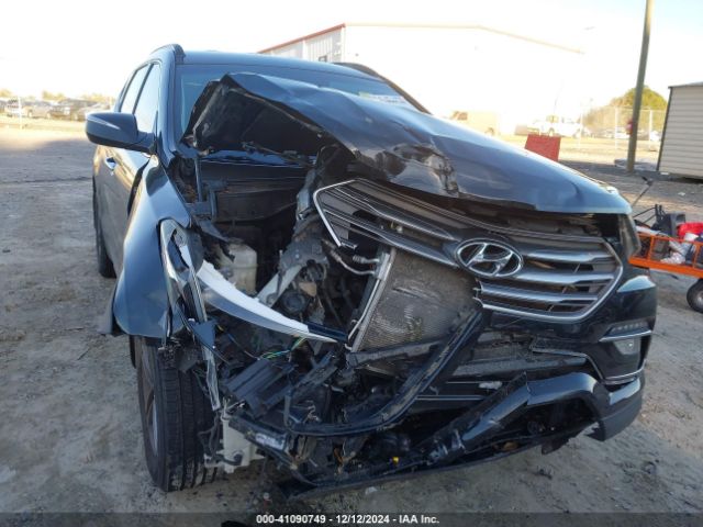 5NMZU3LB5HH001232 Hyundai Santa Fe Sport 2.4l