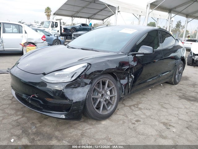 2023 TESLA MODEL 3 5YJ3E1EA9PF393899 Photo 1