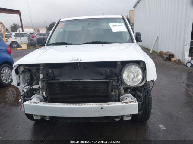 1C4NJPBAXFD247237 Jeep Patriot Sport