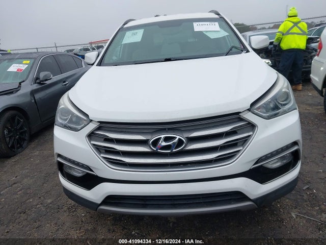 5NMZU3LB4HH005353 Hyundai Santa Fe Sport 2.4l