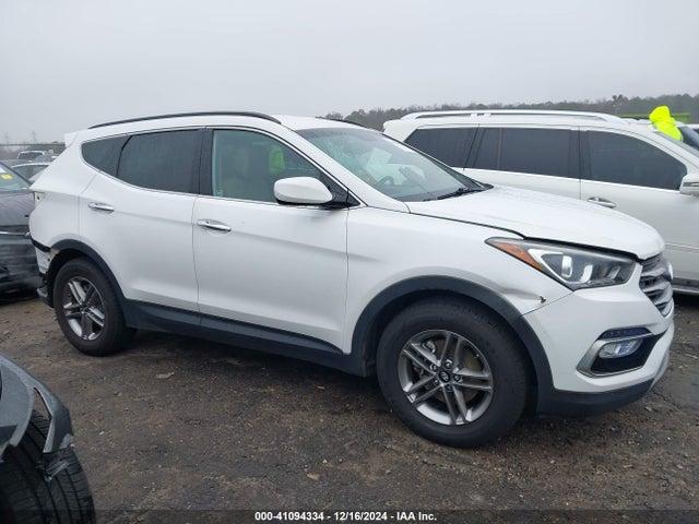5NMZU3LB4HH005353 Hyundai Santa Fe Sport 2.4l