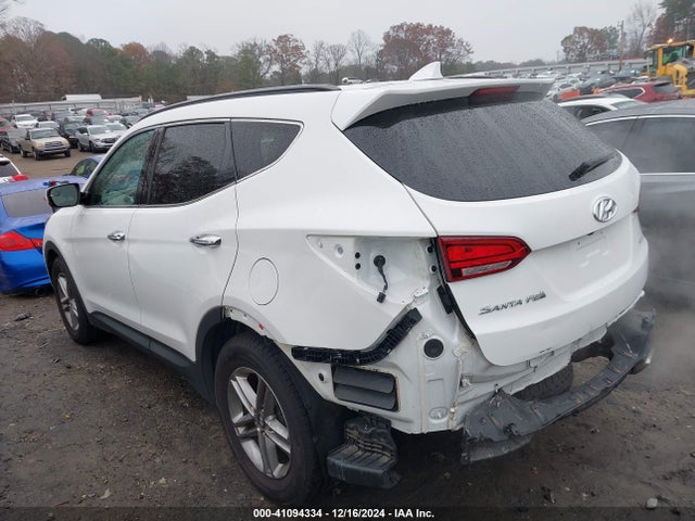 5NMZU3LB4HH005353 Hyundai Santa Fe Sport 2.4l