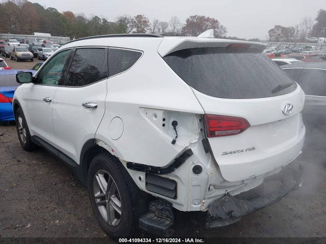 5NMZU3LB4HH005353 Hyundai Santa Fe Sport 2.4l