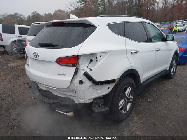 5NMZU3LB4HH005353 Hyundai Santa Fe Sport 2.4l