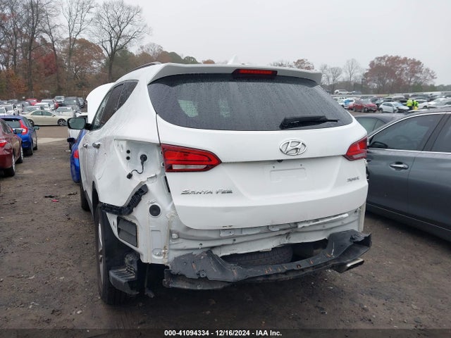 5NMZU3LB4HH005353 Hyundai Santa Fe Sport 2.4l