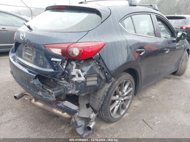 3MZBN1L34JM204883 Mazda Mazda3 Touring