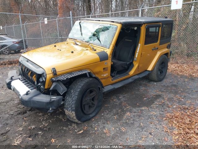 1C4BJWEG8EL229840 Jeep Wrangler Unlimited Sahara