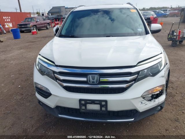 5FNYF6H09HB069887 Honda Pilot Elite