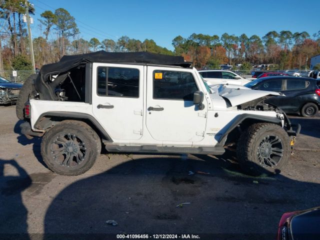 1C4BJWEG4EL122347 Jeep Wrangler Unlimited Sahara